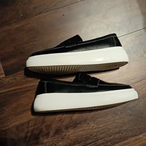 Black platform slip ons